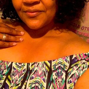 Off the shoulder romper, with Asymmetric neckline.